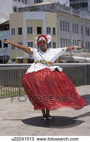Stock Image - Brazil Girls in Brazilian national dress dancing for tourists.. Fotosearch