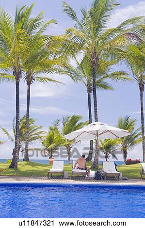 Brazil Hotel pool beside ocean. View Large Photo Image Stock Image - Brazil Hotel pool beside ocean.. Fotosearch