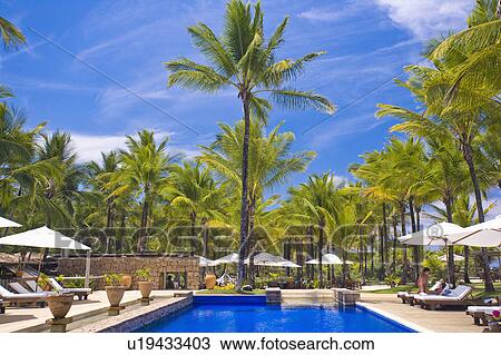 Stock Image - Brazil Hotel pool beside ocean.. Fotosearch