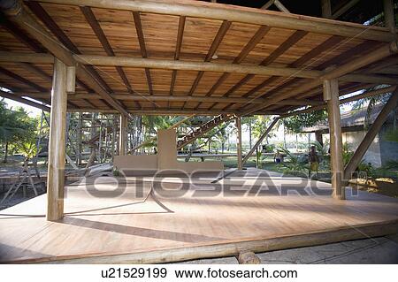 Stock Photo - Brazil. Outdoor wood shelter.. Fotosearch