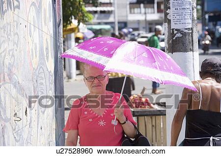 Brazil. Woman. Umbrella. View Large Photo Image Stock Image - Brazil. Woman. Umbrella.. Fotosearch