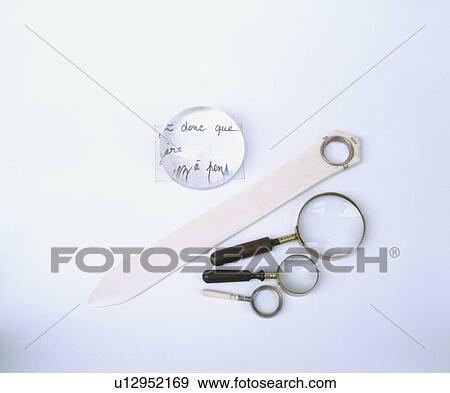 Close-up of antique magnifying glasses View Large Photo Image Stock Photo - Close-up of antique magnifying glasses . Fotosearch