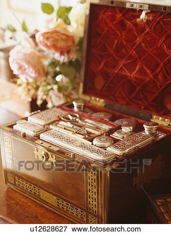 Close-up of antique travelling box with silver-topped bottles View Large Photo Image Stock Photo - Close-up of antique travelling box with silver-topped bottles. Fotosearch