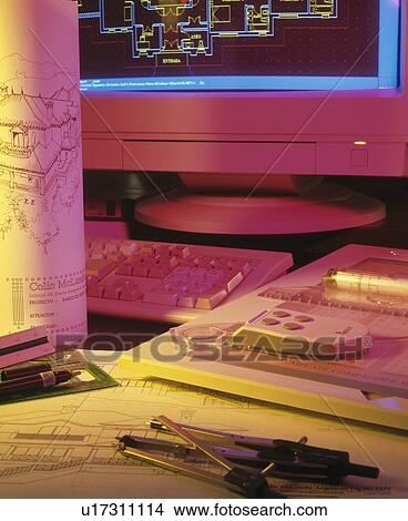 Close-up of architects tools on desk below computer monitor View Large Photo Image Picture - Close-up of architects tools on desk below computer monitor. Fotosearch