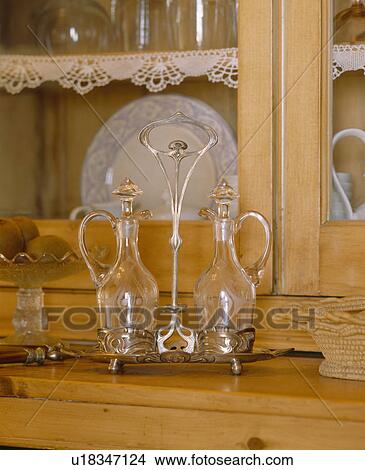 Picture - Close-up of Art Nouveau oil and vinegar bottles. Fotosearch