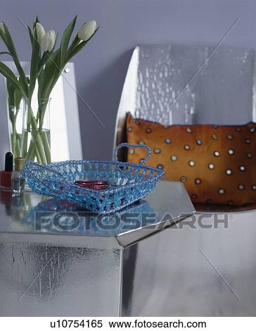 Close-up of blue beaded bowl on metallic silver cardboard table View Large Photo Image Stock Photography - Close-up of blue beaded bowl on metallic silver cardboard table. Fotosearch