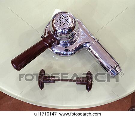 Close-up of chrome hair-dryer View Large Photo Image Stock Photo - Close-up of chrome hair-dryer. Fotosearch