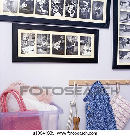 Close-up of collection of black+white photographs on wall above peg-rail View Large Photo Image Stock Photography - Close-up of collection of black+white photographs on wall above peg-rail. Fotosearch
