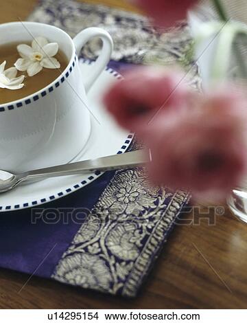 Picture - Close-up of cup of Jasmine tea. Fotosearch