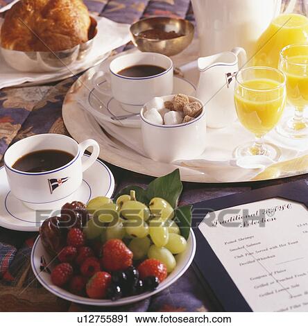 Close-up of cups of coffee and glasses of fruit juice on restaurant table with bowl of grapes View Large Photo Image Stock Image - Close-up of cups of coffee and glasses of fruit juice on restaurant table with bowl of grapes. Fotosearch
