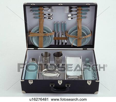 Close-up of cutlery and blue crockery in picnic box with blue Thermos flask View Large Photo Image Stock Image - Close-up of cutlery and blue crockery in picnic box with blue Thermos flask. Fotosearch