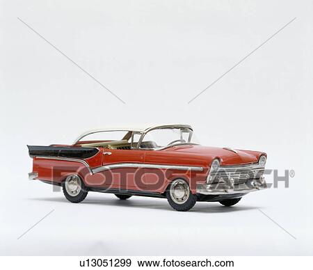 Close-up of Fifties red tin American toy car View Large Photo Image Stock Photo - Close-up of Fifties red tin American toy car. Fotosearch