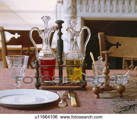 Close-up of glass oil and vinegar bottles View Large Photo Image Stock Photograph - Close-up of glass oil and vinegar bottles. Fotosearch