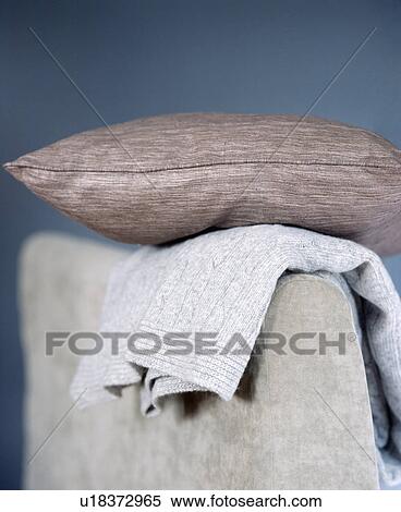 Stock Photography - Close-up of grey silk cushion. Fotosearch