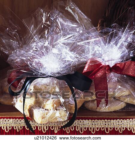 Close-up of home-made biscuits wrapped in cellophane View Large Photo Image Stock Photograph - Close-up of home-made biscuits wrapped in cellophane. Fotosearch