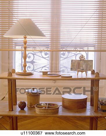 Close-up of lamp and wooden boxes on wooden shelves View Large Photo Image Stock Photo - Close-up of lamp and wooden boxes on wooden shelves. Fotosearch