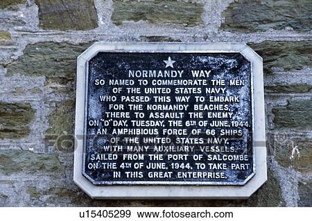 Stock Photo - Close up of metal wall plaque to commemorate the D Day landings of the United States Navy. Fotosearch