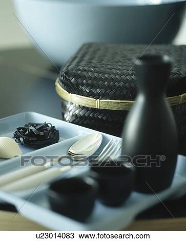 Stock Image - close-up of modern crockery and cutlery. Fotosearch