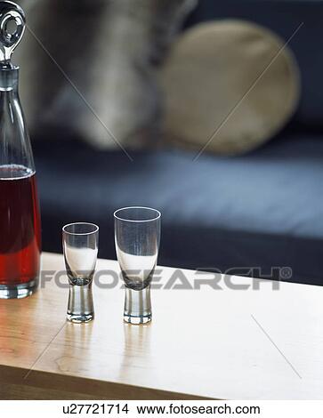 Close-up of modern glass shot-glasses View Large Photo Image Picture - Close-up of modern glass shot-glasses. Fotosearch