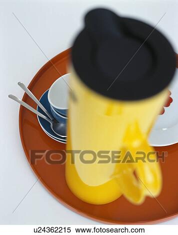 Close-up of modern yellow and black jug View Large Photo Image Stock Photography - Close-up of modern yellow and black jug. Fotosearch