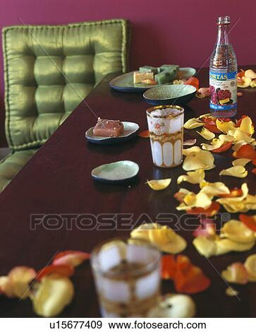 Close-up of Moroccan tea-glasses and yellow flower petals View Large Photo Image Stock Photo - Close-up of Moroccan tea-glasses and yellow flower petals. Fotosearch