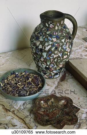 Close-up of mosaic jug and bowl of potpourri View Large Photo Image Stock Photography - Close-up of mosaic jug and bowl of potpourri. Fotosearch