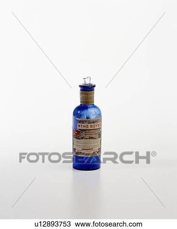 Stock Image - Close-up of old blue glass bottle. Fotosearch