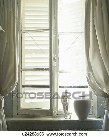 Close-up of open window with external white shutters View Large Photo Image Stock Photograph - Close-up of open window with external white shutters. Fotosearch