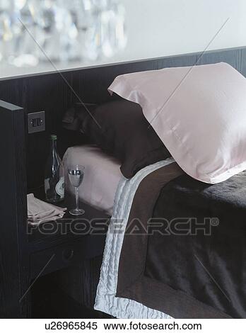 Close-up of pale pink silk pillow on bed with black silk bedlinen View Large Photo Image Stock Photography - Close-up of pale pink silk pillow on bed with black silk bedlinen. Fotosearch