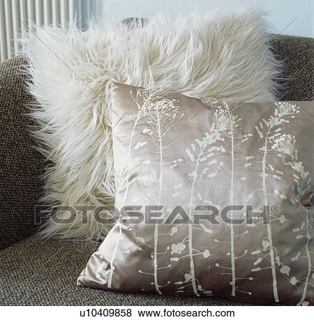 Close up of patterned beige silk cushion and white mohair cushion View Large Photo Image Stock Photo - Close up of patterned beige silk cushion and white mohair cushion. Fotosearch