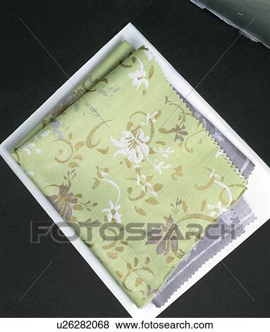 Close-up of patterned pale green fabric swatches View Large Photo Image Stock Photo - Close-up of patterned pale green fabric swatches. Fotosearch