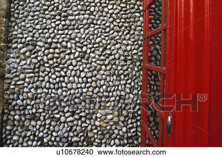 Close up of pebble wall and red telephone box at Blakeney View Large Photo Image Stock Image - Close up of pebble wall and red telephone box at Blakeney. Fotosearch