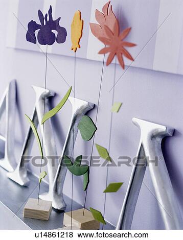 Close-up of pink and blue wooden flowers View Large Photo Image Stock Photo - Close-up of pink and blue wooden flowers. Fotosearch