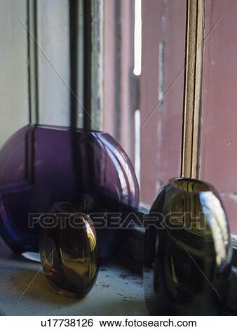 Close-up of purple and brown modern glass vases View Large Photo Image Stock Photograph - Close-up of purple and brown modern glass vases. Fotosearch