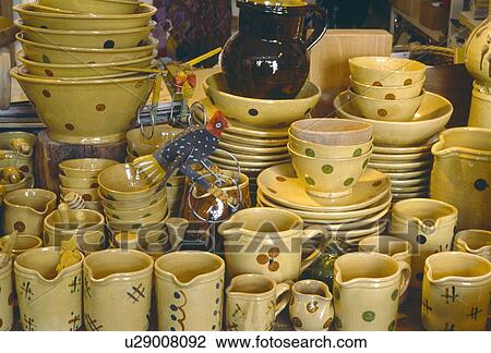 Close-up of rustic pottery spotted cream jugs and cups with matching bowls View Large Photo Image Stock Image - Close-up of rustic pottery spotted cream jugs and cups with matching bowls. Fotosearch