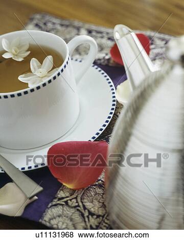 Stock Photo - Close-up of teacup with Jasmine tea. Fotosearch