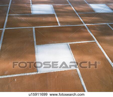 Close-up of terracotta and white floor tiles View Large Photo Image Stock Photo - Close-up of terracotta and white floor tiles. Fotosearch