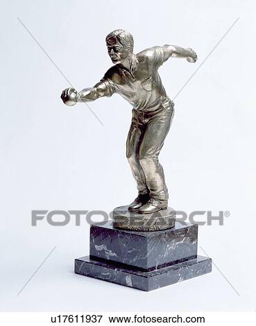 Close-up of thirties pewter statue of cricketer bowler View Large Photo Image Stock Photo - Close-up of thirties pewter statue of cricketer bowler. Fotosearch