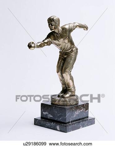 Close-up of Thirties statue of a cricketer View Large Photo Image Stock Photo - Close-up of Thirties statue of a cricketer. Fotosearch