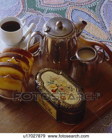 Close-up of toast rack with chrome teapot and jug and old decorative tin View Large Photo Image Stock Photo - Close-up of toast rack with chrome teapot and jug and old decorative tin. Fotosearch