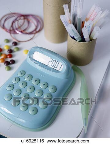 Close-up of turquoise calculator View Large Photo Image Stock Photograph - Close-up of turquoise calculator. Fotosearch