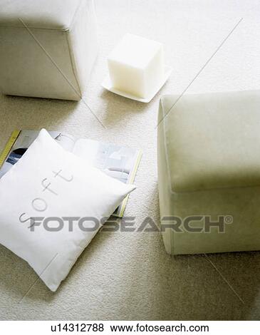 Close-up of white cushion and upholstered square stool View Large Photo Image Stock Photo - Close-up of white cushion and upholstered square stool. Fotosearch