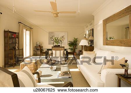 Cream coloured livingroom with ceiling fan. View Large Photo Image Stock Photography - Cream coloured livingroom with ceiling fan.. Fotosearch