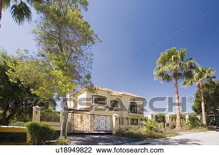 Exterior of modern detached house or villa in Southern Spain. View Large Photo Image Stock Image - Exterior of modern detached house or villa in Southern Spain.. Fotosearch