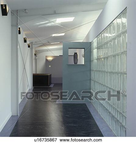 Glass brick wall in modern hall with granite flooring View Large Photo Image Stock Photo - Glass brick wall in modern hall with granite flooring. Fotosearch