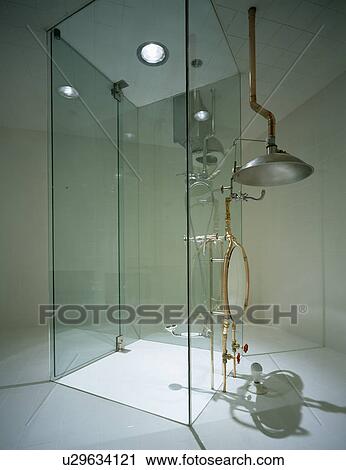 Glass shower cabinet in modern bathroom designed by Brian Murphy View Large Photo Image Stock Image - Glass shower cabinet in modern bathroom designed by Brian Murphy. Fotosearch