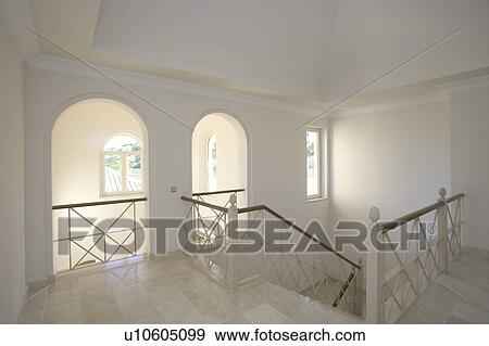Hallway in the Mclundie apartment with arches to ground floor. View Large Photo Image Stock Photo - Hallway in the Mclundie apartment with arches to ground floor.. Fotosearch