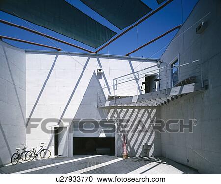 Metal balcony in modern courtyard of house designed by Brian Murphy for the actor Dennis Hopper View Large Photo Image Stock Image - Metal balcony in modern courtyard of house designed by Brian Murphy for the actor Dennis Hopper. Fotosearch