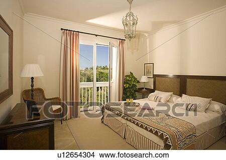 Picture - Modern bedroom overlooking countryside.. Fotosearch