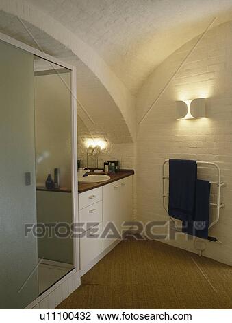 Modern white bathroom in converted Martello Tower View Large Photo Image Stock Image - Modern white bathroom in converted Martello Tower. Fotosearch